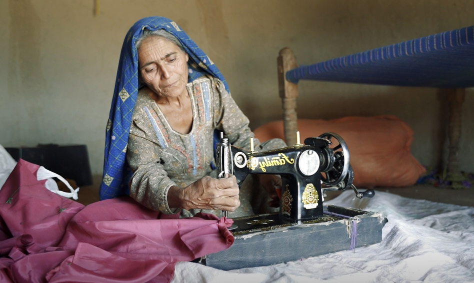 Woman working with a sewing machine