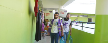 Food parcels being distributed in a Lebanese shelter