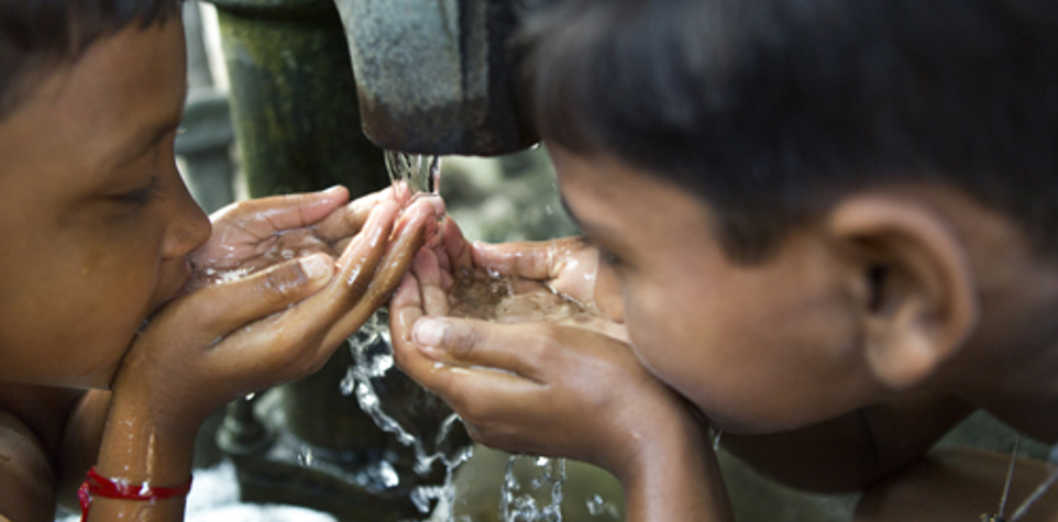 Bangladeshi children drinking water