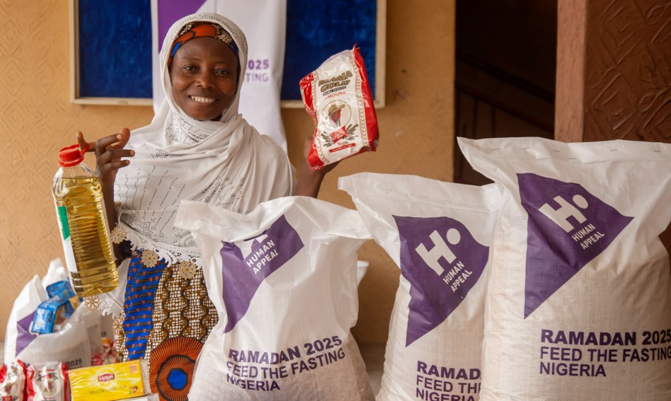 Woman at a FTF distribution in Nigeria