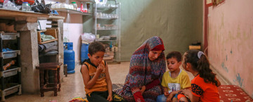 Mother and children eating Suhoor