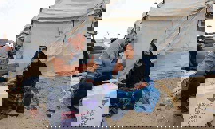 Staff member delivering food parcel