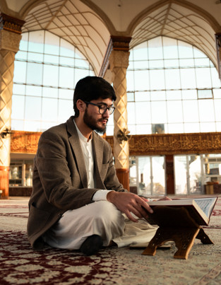 Man reading in a mosque