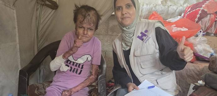 Our field team registering Reema's case in Gaza.