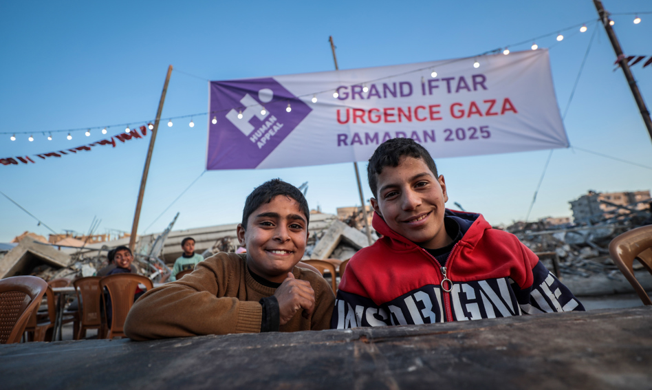 Two young men at a Grand Iftar in Gaza