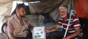 A member of our staff providing a Qurbani package.