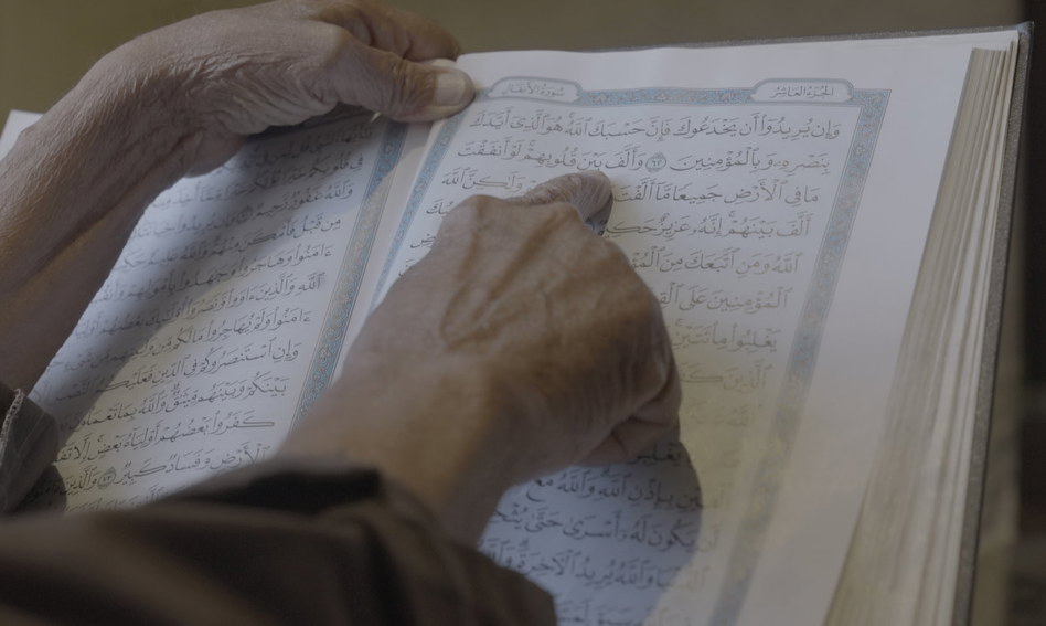 Man reading from the Qur'an