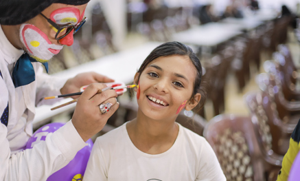 Child getting her face painted