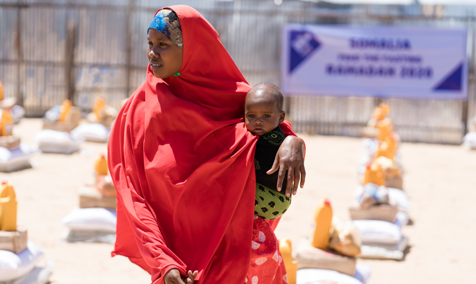 Mother and child at a distribution