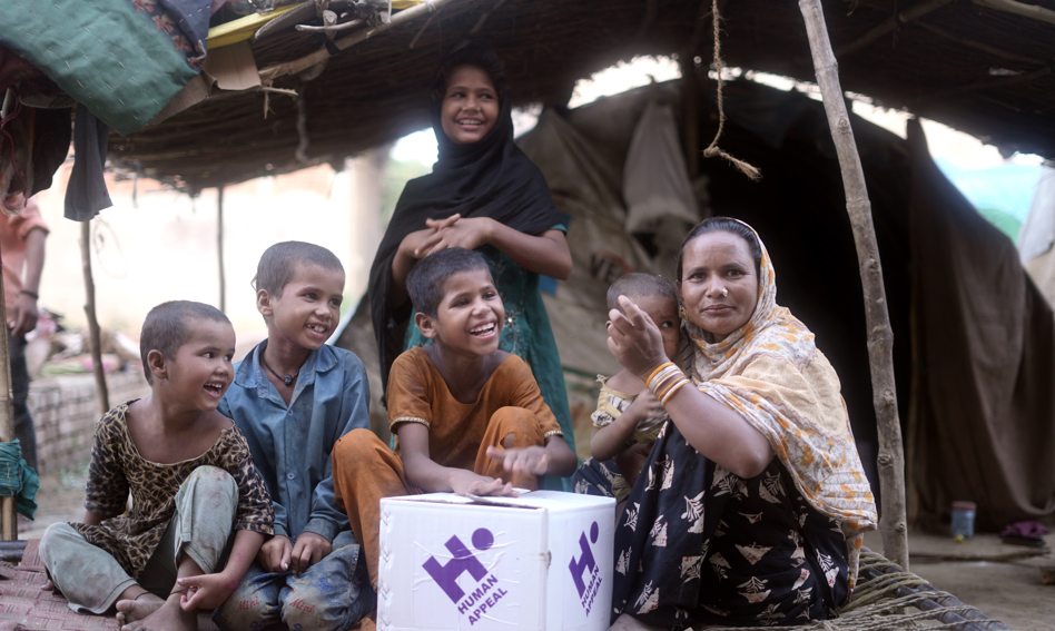 Family with qurbani parcel