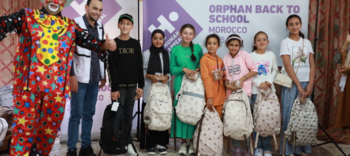 We distributed 625 school bags to children in Morocco at a back to school event.