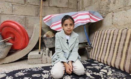Child sitting in a room