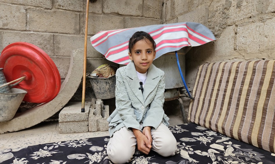 Child sitting in a room