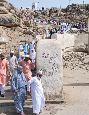Pilgrims walking down stairs 