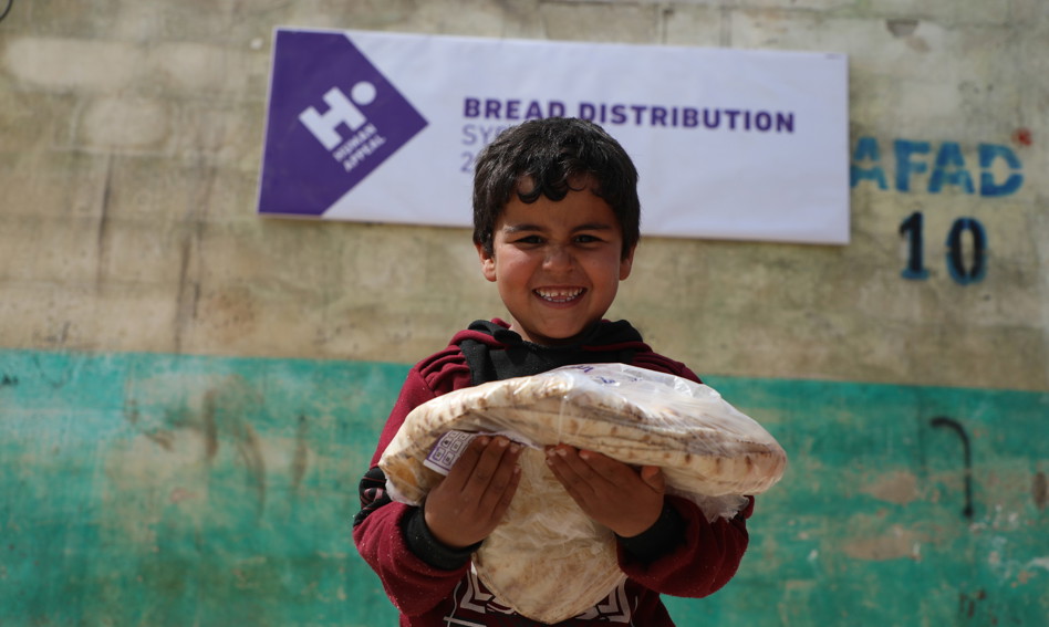 Child holding bread