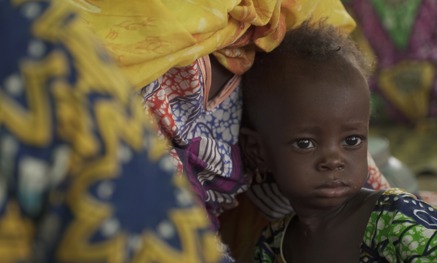 Child being held by mother